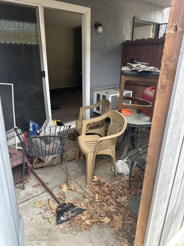 Patio trash removal — Before