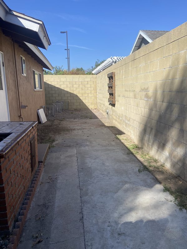 Side yard junk removal — After